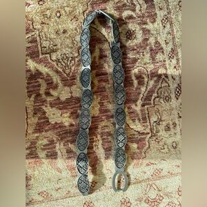 Vintage silver-tone metal belt w/ open-work links with a floral design